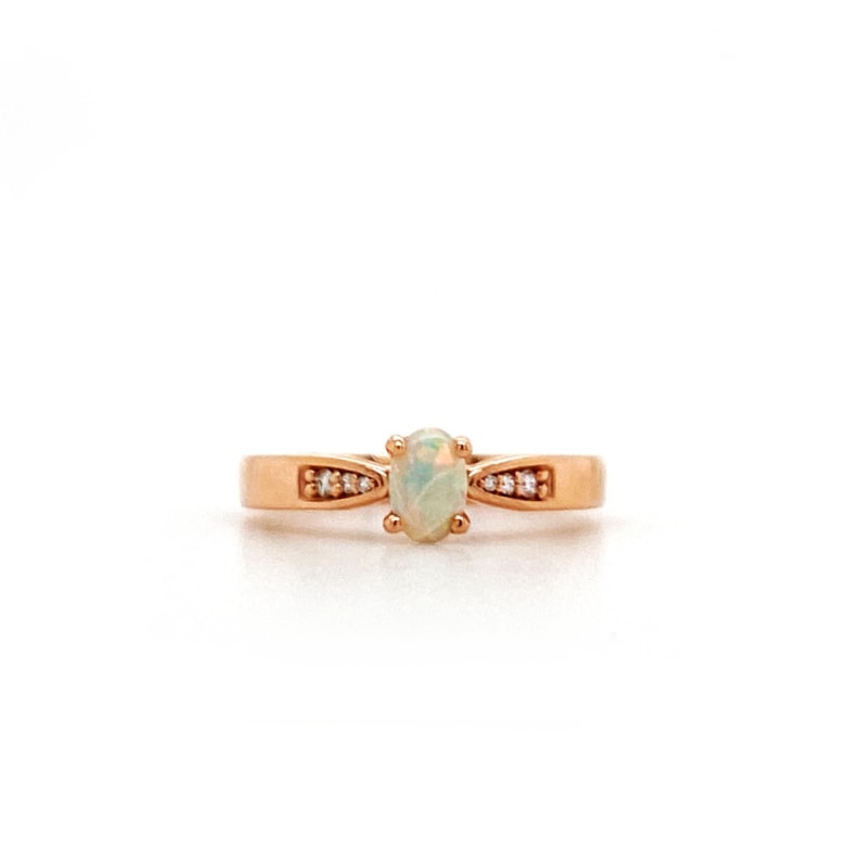 Opal and Diamond Ring set in Rose Gold