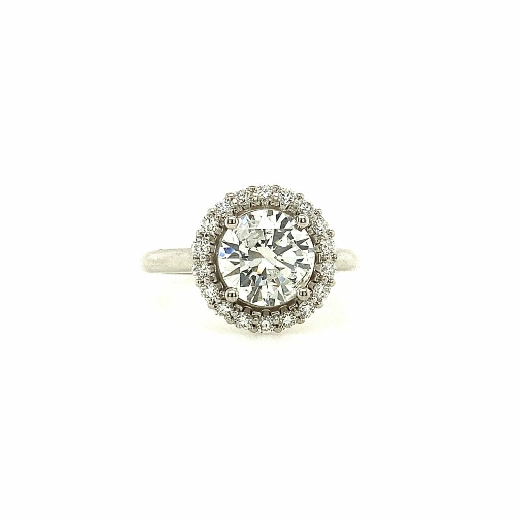 Astonishing Round Diamond Halo Ring